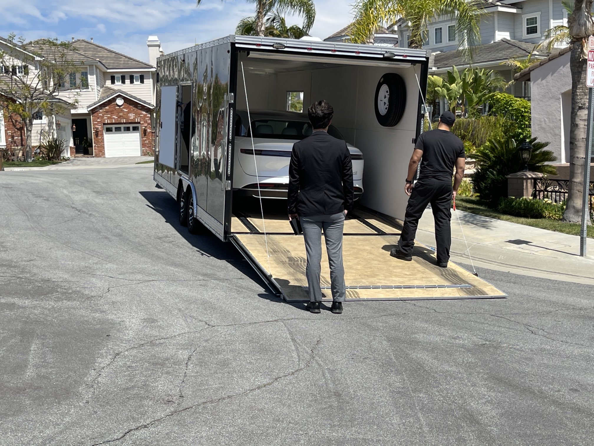 Watch A Lucid Air Being Delivered Out Of A Trailer