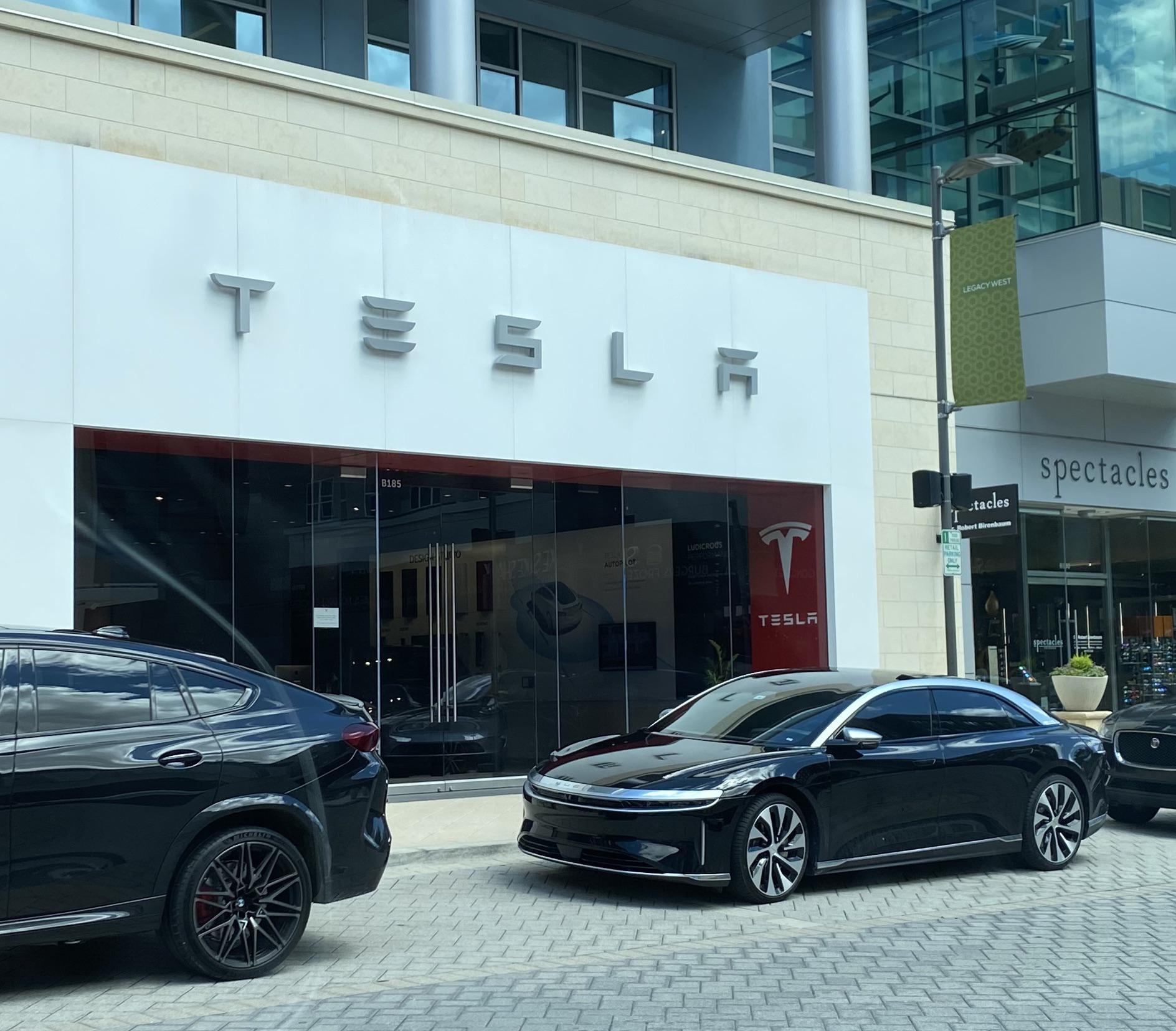 A Lucid Air Photobombing A Tesla Studio