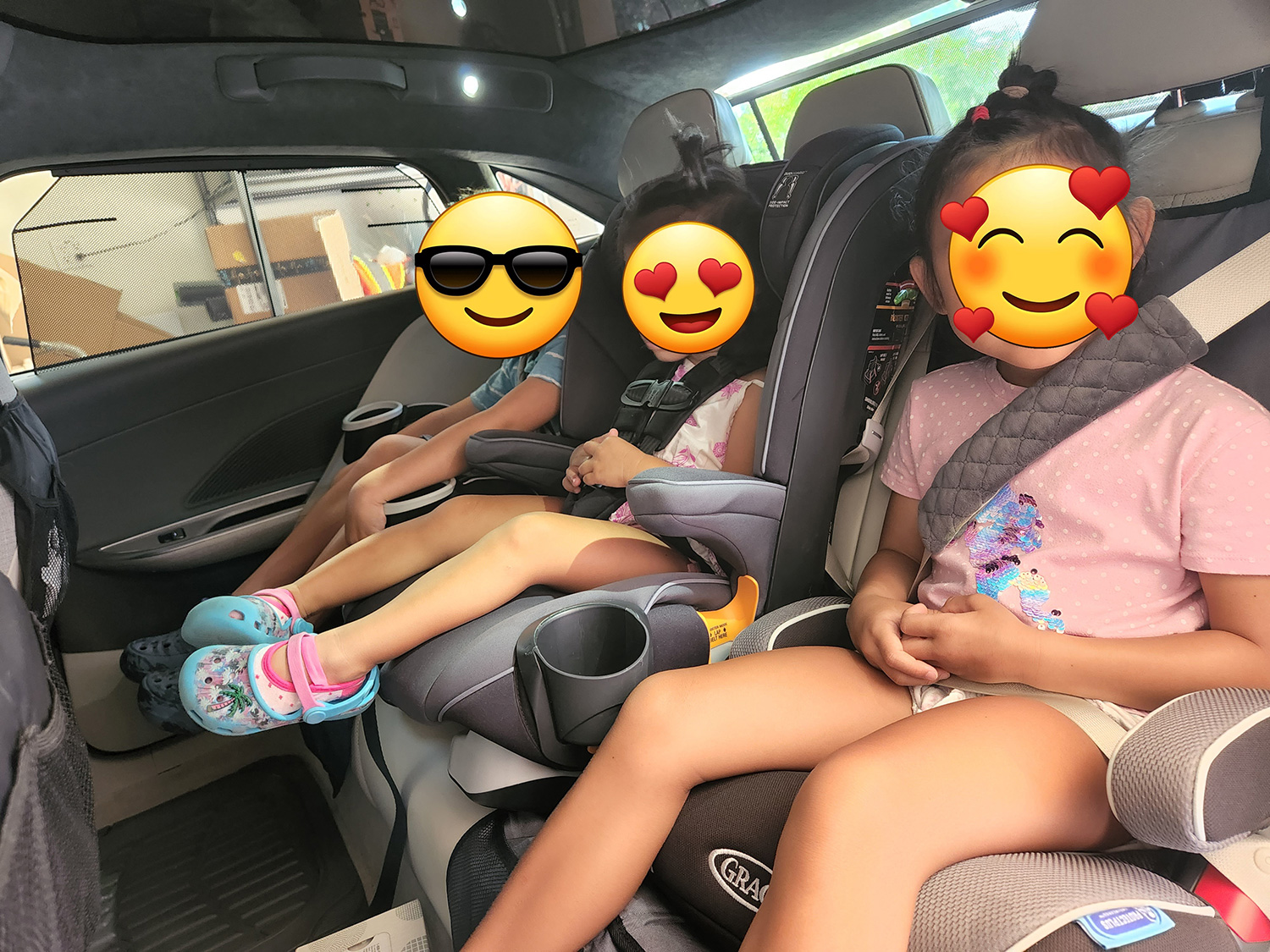 Lucid Air With Three Car Seats In Back Row